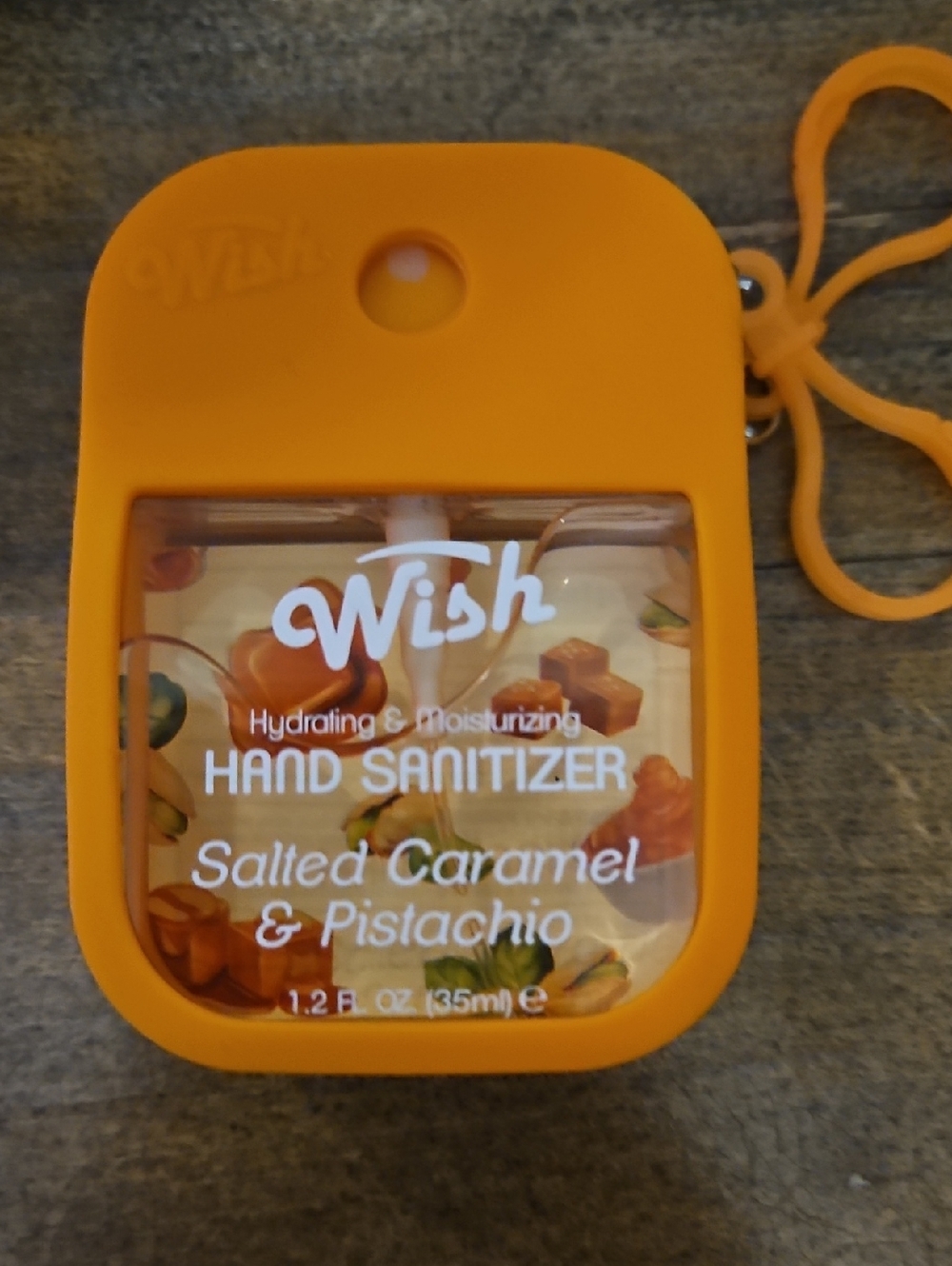 Wish Orange Silicone Case Hydrating Hand Sanitizer - Salted Caramel & Pistachio